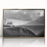 Framed wall art featuring a coastal landscape with a lighthouse, surrounded by vibrant ocean waves and a golden acrylic front, perfect for home decor.