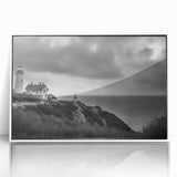Framed acrylic wall art featuring a serene lighthouse landscape design, showcasing vibrant colors and intricate details, perfect for coastal-themed decor.