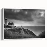 Framed wall art showcasing a serene lighthouse landscape design, featuring soft blue and white tones, perfect for coastal decor in a modern home setting.