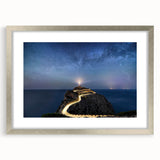 Framed wall art collection showcasing a serene lighthouse landscape design with a silver mat, perfect for coastal-themed decor and home interior styling.