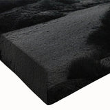 Close-up of a stretched canvas featuring a vibrant lighthouse design, showcasing detailed brushwork and vivid colors against a serene ocean backdrop, ideal for coastal-themed decor.