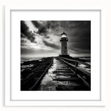 Framed wall art featuring a serene lighthouse landscape design, showcasing vibrant colors and intricate details, ideal for coastal-themed home decor.