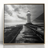 Framed wall art featuring a coastal lighthouse design with a gold-accented acrylic front, perfect for enhancing nautical-themed decor and brightening living spaces.
