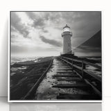 Framed wall art featuring a serene lighthouse landscape design with a white border, perfect for coastal decor. The acrylic finish enhances the vibrant colors, ideal for brightening living spaces.
