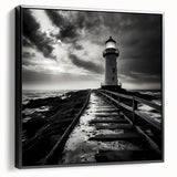 Framed canvas wall art featuring a serene lighthouse design with a scenic landscape, displayed from a side view against a black background, perfect for coastal decor.