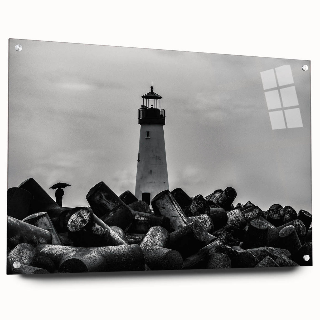 Acrylic glass wall art showcasing a vibrant lighthouse landscape design, beautifully displayed from a side view and accented with colorful pins for a dynamic touch. Ideal for coastal-themed decor or nautical enthusiasts.