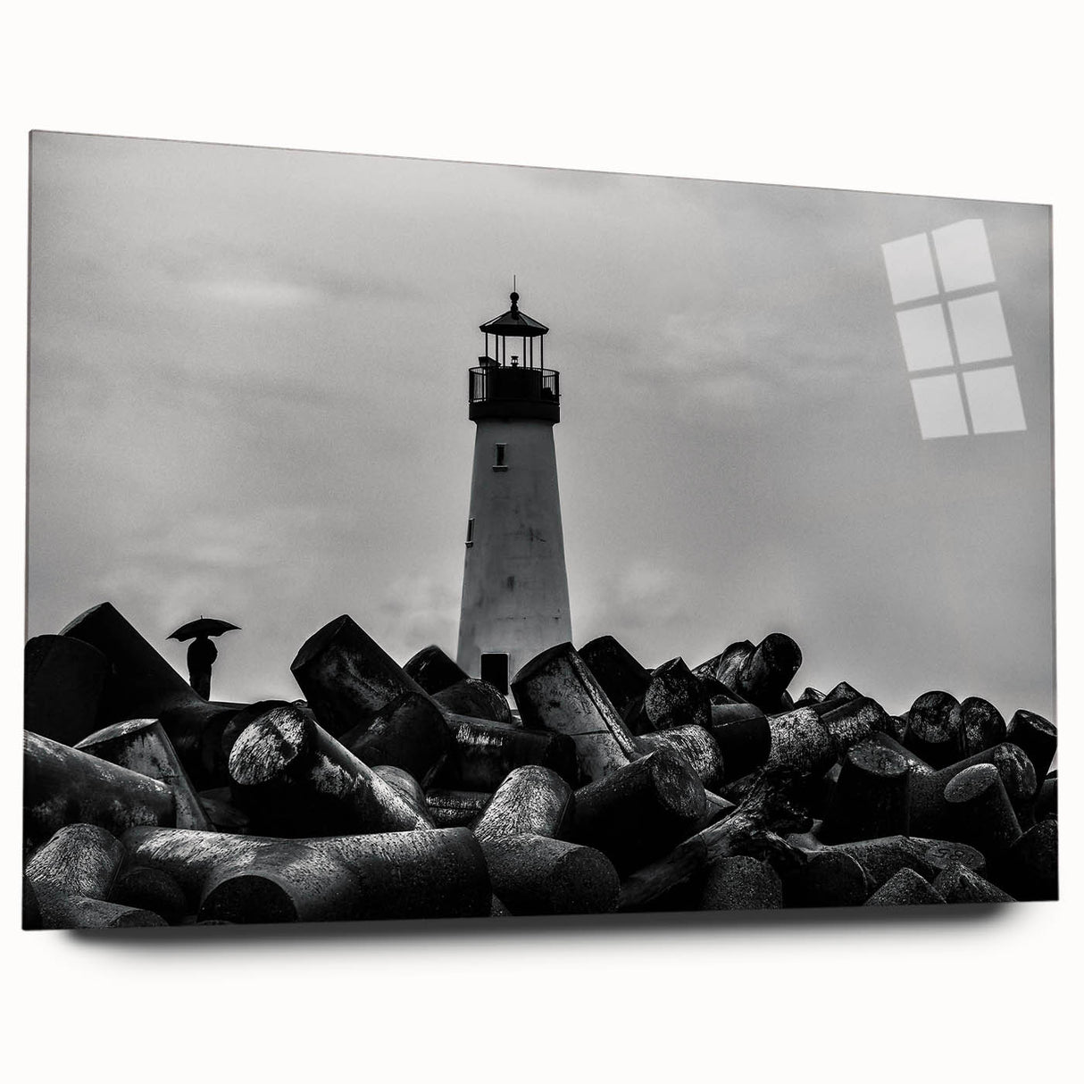 Acrylic glass wall art featuring a vibrant lighthouse design, showcasing a scenic coastal landscape with a dramatic sky, perfect for nautical-themed decor.
