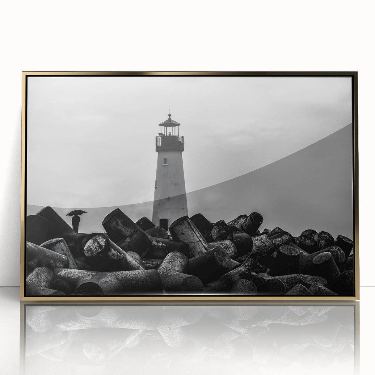 Framed wall art showcasing a serene lighthouse design in a coastal landscape, featuring a gold-acrylic finish that enhances its vibrant colors and adds elegance to any decor.