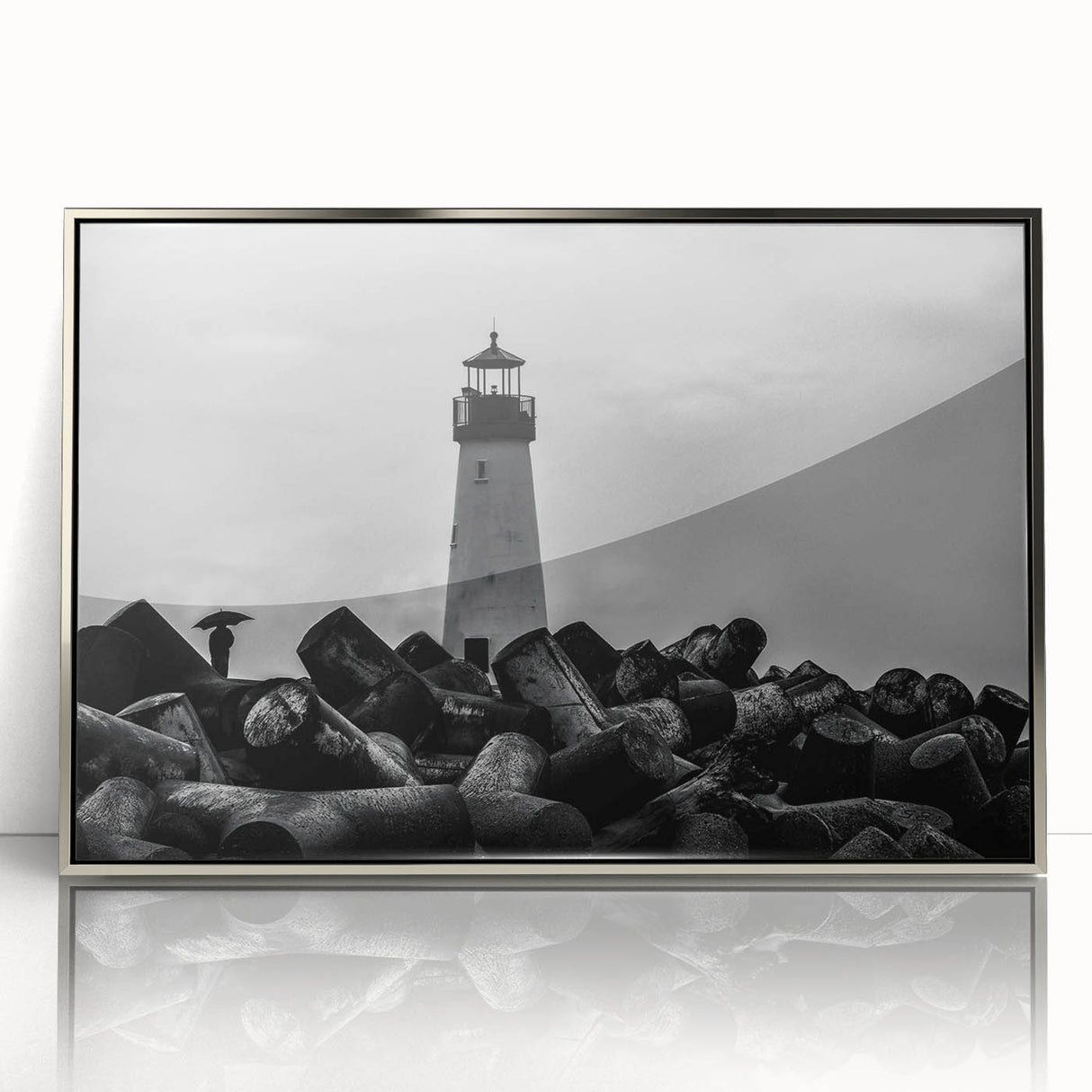 Framed acrylic wall art featuring a striking lighthouse design with a silver border, ideal for coastal-themed decor. Perfect for adding a touch of elegance to any room.