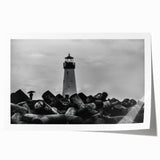 Rolled print showcasing a vibrant lighthouse landscape design, featuring rich colors and detailed textures, ideal for coastal-themed home decor. Perfectly packaged for safe delivery.