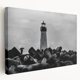 Stretched canvas wall art showcasing a serene lighthouse landscape design, featuring vibrant colors and intricate details, perfect for coastal-themed decor.