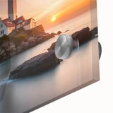 Close-up of a vibrant acrylic glass wall art piece featuring a serene lighthouse landscape design, showcasing detailed colors and textures, perfect for coastal decor.