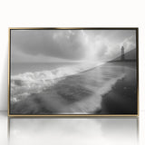 Framed wall art featuring a stunning coastal lighthouse design in a gold-accented frame, perfect for enhancing home decor with a nautical theme.