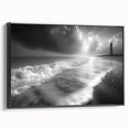 Framed canvas wall art featuring a serene lighthouse landscape design, accented with black framing, ideal for coastal-themed decor and home styling.