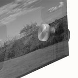 Close-up of an acrylic glass wall art piece showcasing a vibrant lighthouse design with coastal landscapes, ideal for home décor and adding a nautical touch.