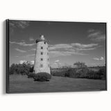Framed canvas wall art featuring a scenic lighthouse design with vibrant colors, black frame, and side view showcasing the artwork's depth and texture, ideal for home decor.