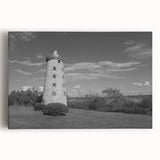 Stretched canvas wall art showcasing a vibrant lighthouse design with serene ocean waves, perfect for coastal-themed decor. Ideal for adding tranquility to any room.