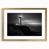Framed wall art featuring a serene lighthouse landscape design, accented with a gold frame and mat, perfect for adding a coastal touch to home decor.