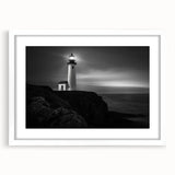Framed wall art featuring a serene lighthouse landscape design with a white mat, showcasing calming ocean hues, perfect for home decor or coastal themes.