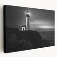 Stretched canvas wall art featuring a vibrant lighthouse design, showcasing vivid colors and intricate details, perfect for coastal-themed home decor.