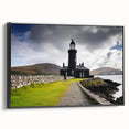 Framed canvas wall art showcasing a serene coastal landscape with a lighthouse, featuring rich colors and intricate details, perfect for home decor enthusiasts.