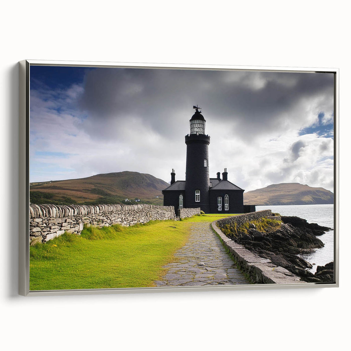 Framed canvas wall art showcasing a serene lighthouse landscape design, featuring vibrant colors and a silver frame, perfect for coastal-themed decor.