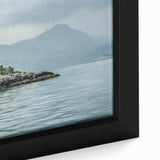Close-up of a framed canvas wall art piece depicting a serene lighthouse landscape, showcasing vibrant colors and intricate details, perfect for nautical-themed decor.