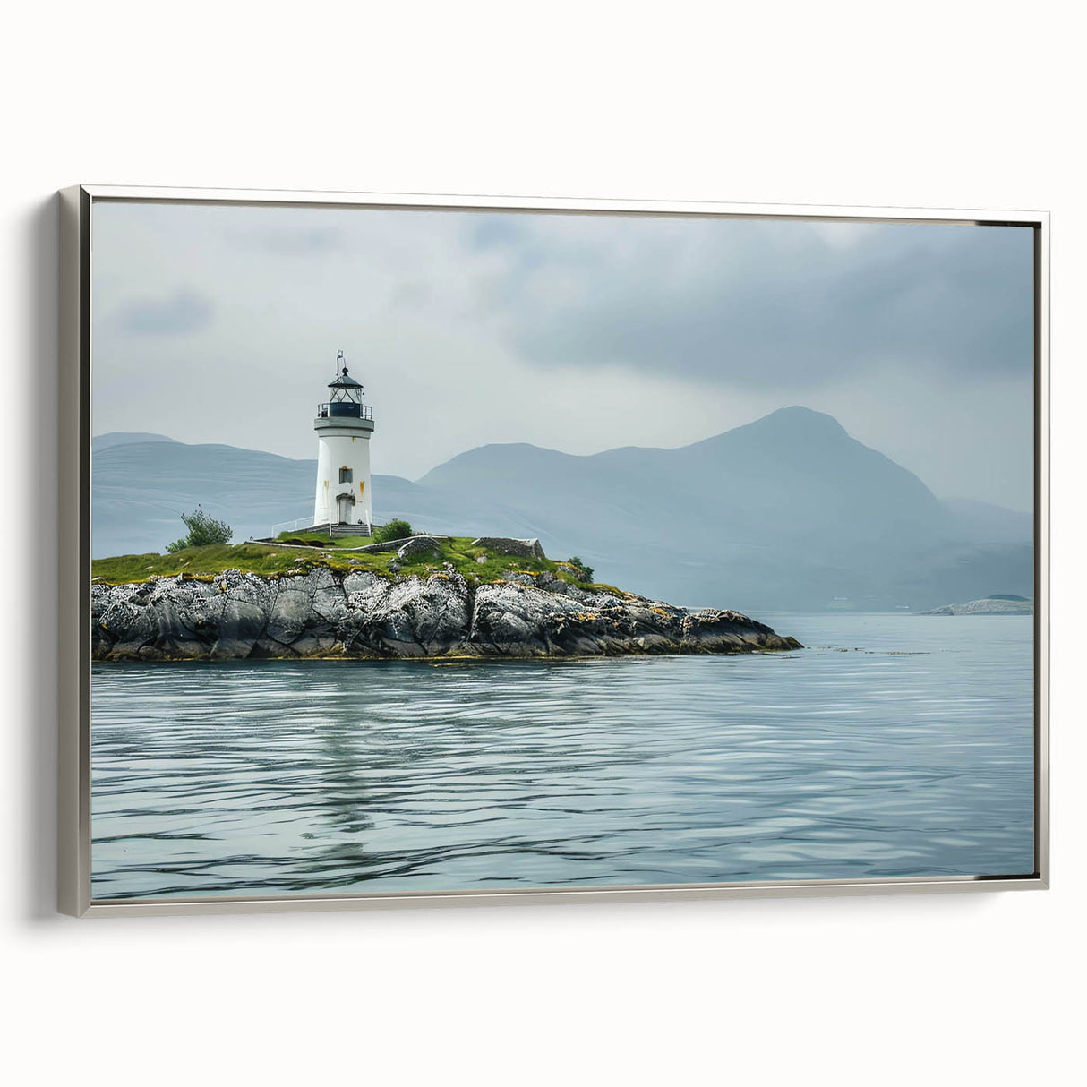 Framed canvas wall art showcasing a stunning silver-framed lighthouse design in a serene landscape, perfect for nautical-themed home decor.