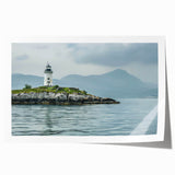 Lighthouse landscape wall art print showcasing a vibrant coastal scene with a dramatic sky, perfect for home decor enthusiasts seeking nautical themes.