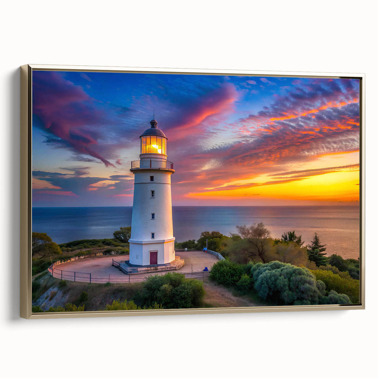 Framed wall art showcasing a serene lighthouse design in a coastal landscape, featuring a gold frame and vibrant colors, perfect for home decor enthusiasts.