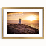 Elegant gold-framed wall art featuring a serene lighthouse landscape design, perfect for enhancing home decor. The artwork includes a white mat for a polished look, emphasizing the calming coastal scene.