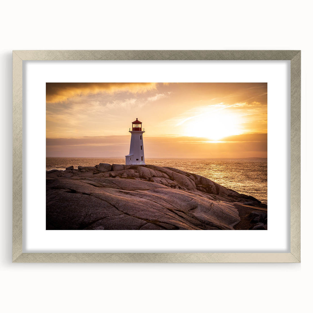 Framed wall art featuring a serene lighthouse landscape design with a silver mat, showcasing vibrant colors and intricate details, ideal for coastal decor.