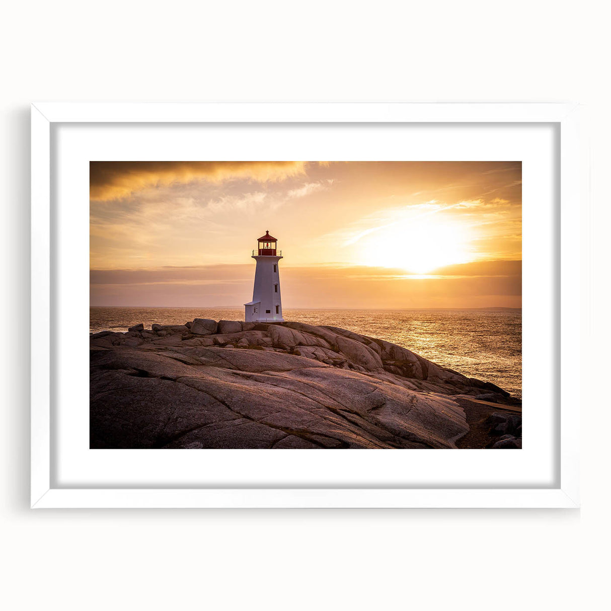Framed wall art featuring a coastal lighthouse design with vibrant colors, white matting, and a sleek black frame, perfect for enhancing beach-inspired decor.