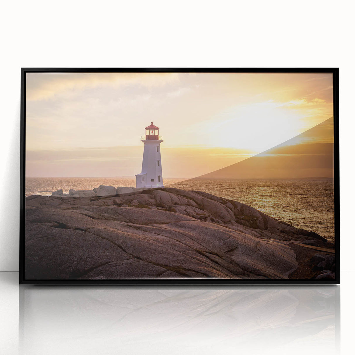 Framed black acrylic wall art showcasing a stunning lighthouse landscape design, ideal for home decor, adding a coastal charm to any room setting.