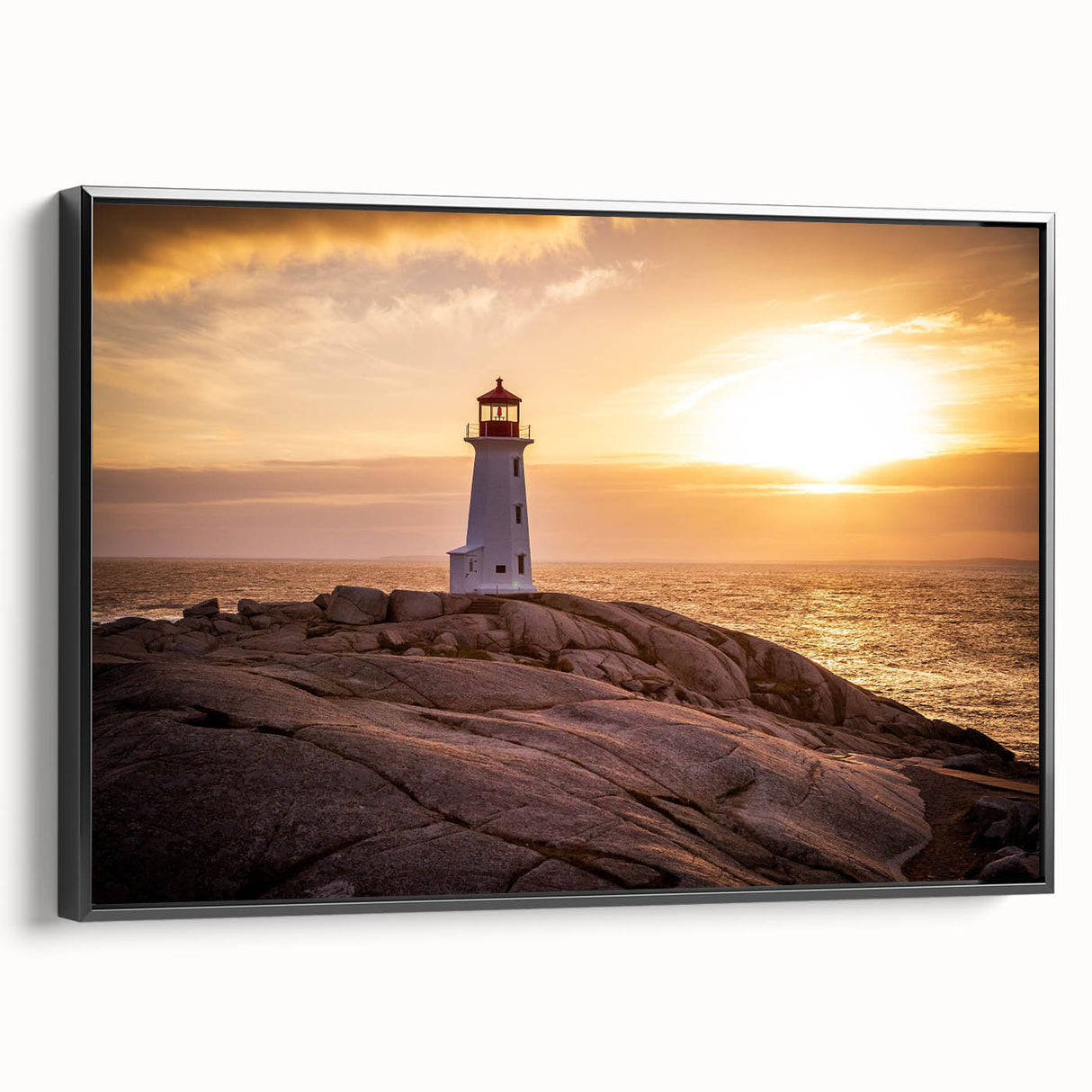 Framed canvas wall art featuring a serene lighthouse design, showcasing vibrant colors against a sunset backdrop. Ideal for coastal-themed home decor.