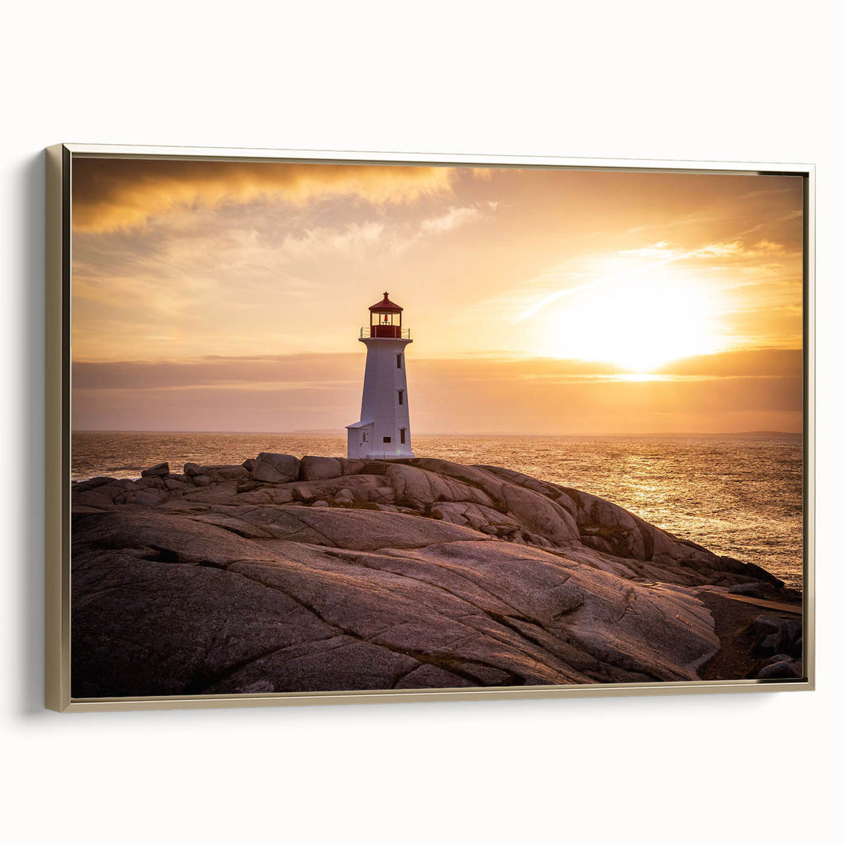 Framed wall art featuring a lighthouse design in a gold frame, set against a serene landscape background, ideal for coastal home decor enthusiasts.