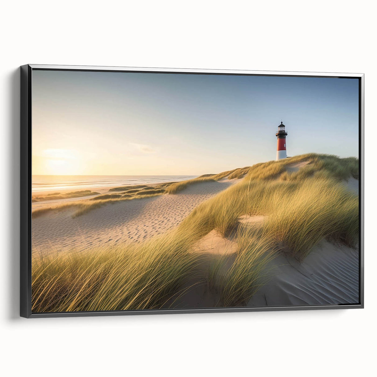 Framed canvas wall art showcasing a serene lighthouse design against a vibrant sunset, featuring a sleek black frame, perfect for coastal-themed decor.