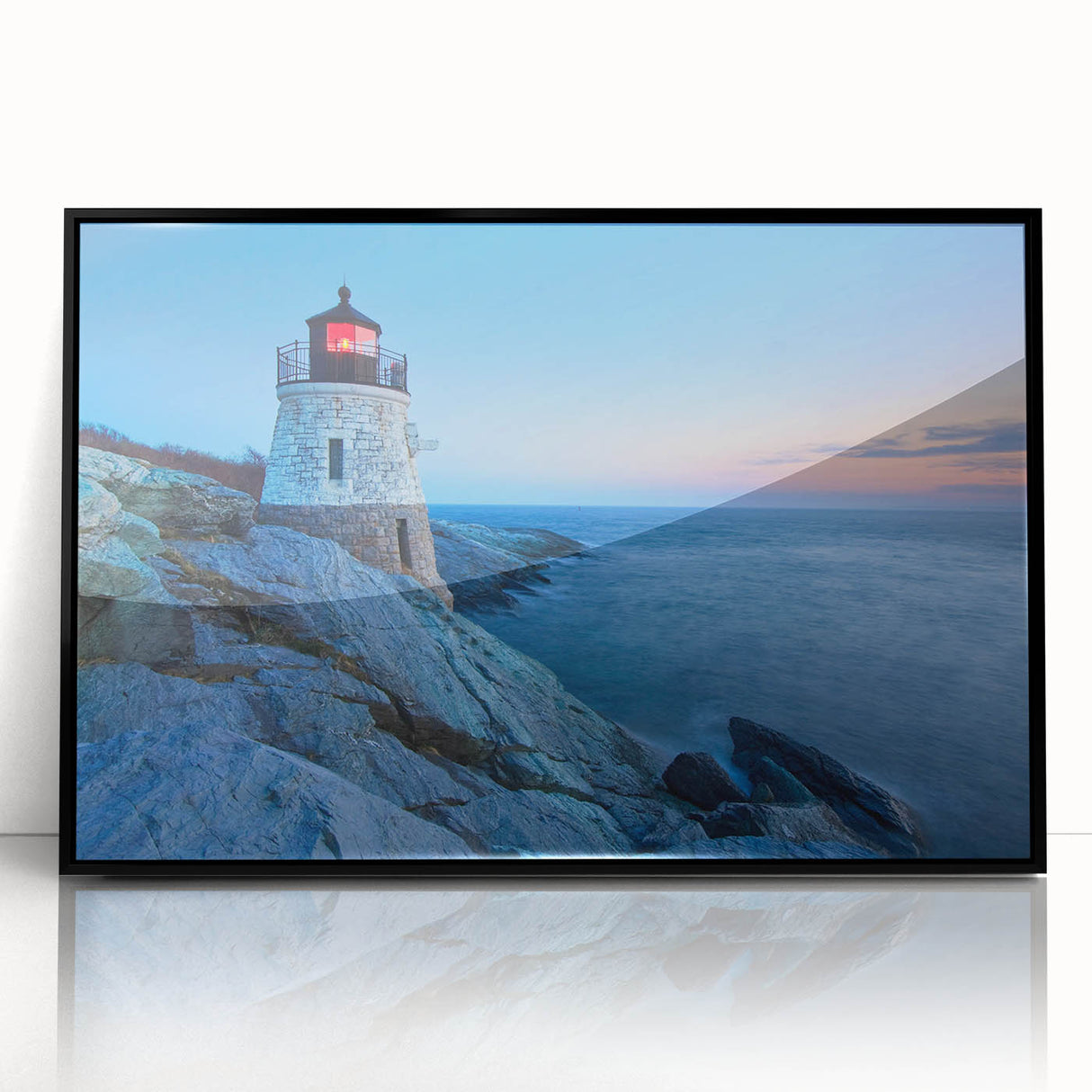 Framed acrylic wall art featuring a serene lighthouse at sunset, showcasing vibrant colors and intricate details, perfect for coastal home décor.