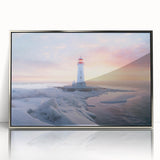 Framed acrylic wall art featuring a striking silver lighthouse design, perfect for coastal-themed decor. The artwork captures serene ocean waves and a vibrant sunset, adding elegance to any room.
