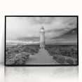Framed acrylic wall art collection showcasing a scenic lighthouse design, with a sleek black frame and clear front view, perfect for coastal-themed decor.