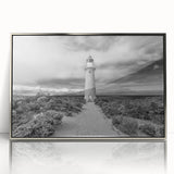 Framed wall art collection showcasing a scenic lighthouse design, featuring a silver-acrylic frame that enhances coastal aesthetics. Perfect for home decor enthusiasts.