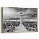 Framed wall art collection showcasing a coastal lighthouse design on a textured canvas, featuring a gold frame, perfect for enhancing nautical-themed decor.