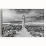 Stretched canvas wall art showcasing a serene lighthouse landscape at sunset, featuring vibrant colors and intricate details, perfect for coastal décor enthusiasts.