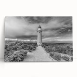 Stretched canvas wall art collection featuring a serene lighthouse landscape design with vibrant colors, ideal for coastal-themed decor. Perfect for enhancing home aesthetics.
