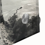 Close-up of a vibrant acrylic glass wall art piece showcasing a lighthouse design against a dramatic landscape, perfect for coastal-themed decor.