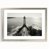 Framed landscape wall art collection featuring a silver mat and lighthouse design, perfect for coastal decor, displayed from a front view to highlight details.