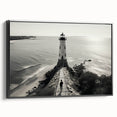 Framed wall art collection depicting a serene lighthouse landscape design, featuring vibrant colors and intricate details, showcased from a black side view, ideal for coastal-themed decor.
