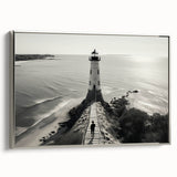Framed canvas wall art collection showcasing a coastal lighthouse design with a silver border, perfect for enhancing home decor in beach-themed settings.