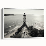 Framed canvas wall art featuring a serene lighthouse and landscape design, showcasing soft pastel colors against a white background, ideal for coastal-themed decor.