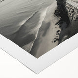 Rolled canvas wall art featuring a serene coastal landscape with a lighthouse, vibrant colors, and soft clouds, designed to enhance home decor aesthetics.